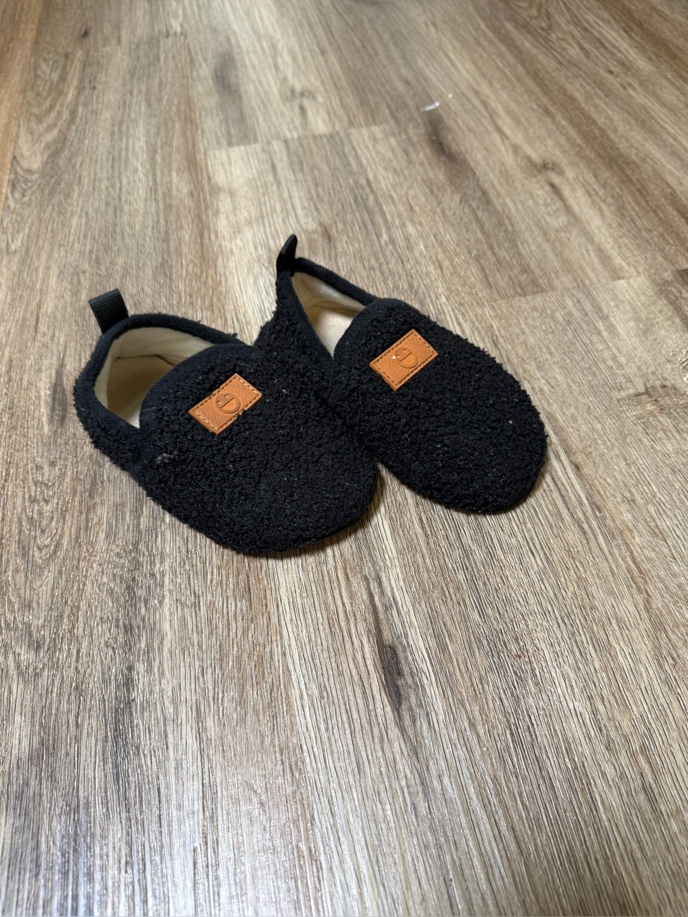 Kids Black Cozy Slip-On Slippers with Tan Patch